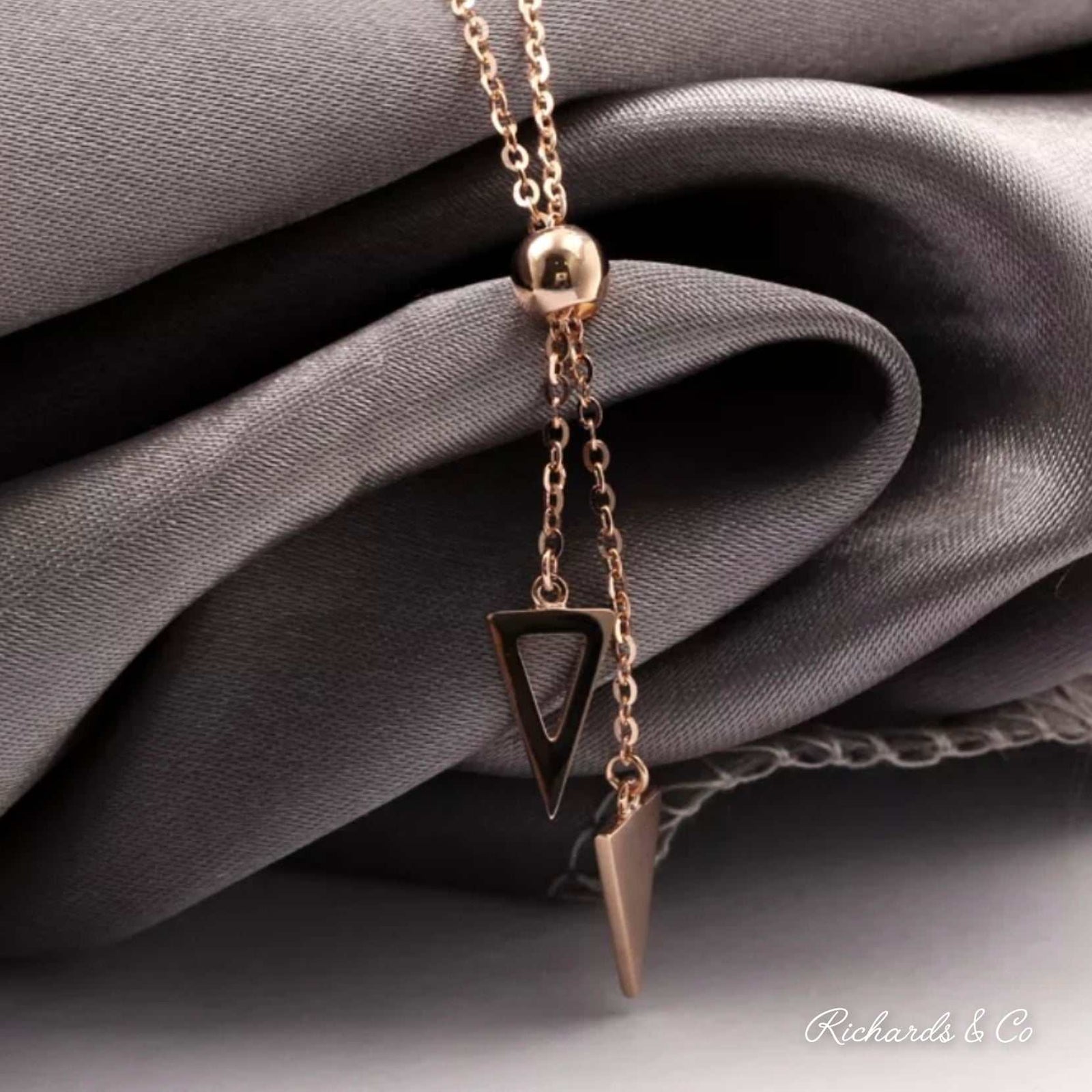18K solid rose gold triangle design necklace with chain ball detail and delicate pendants