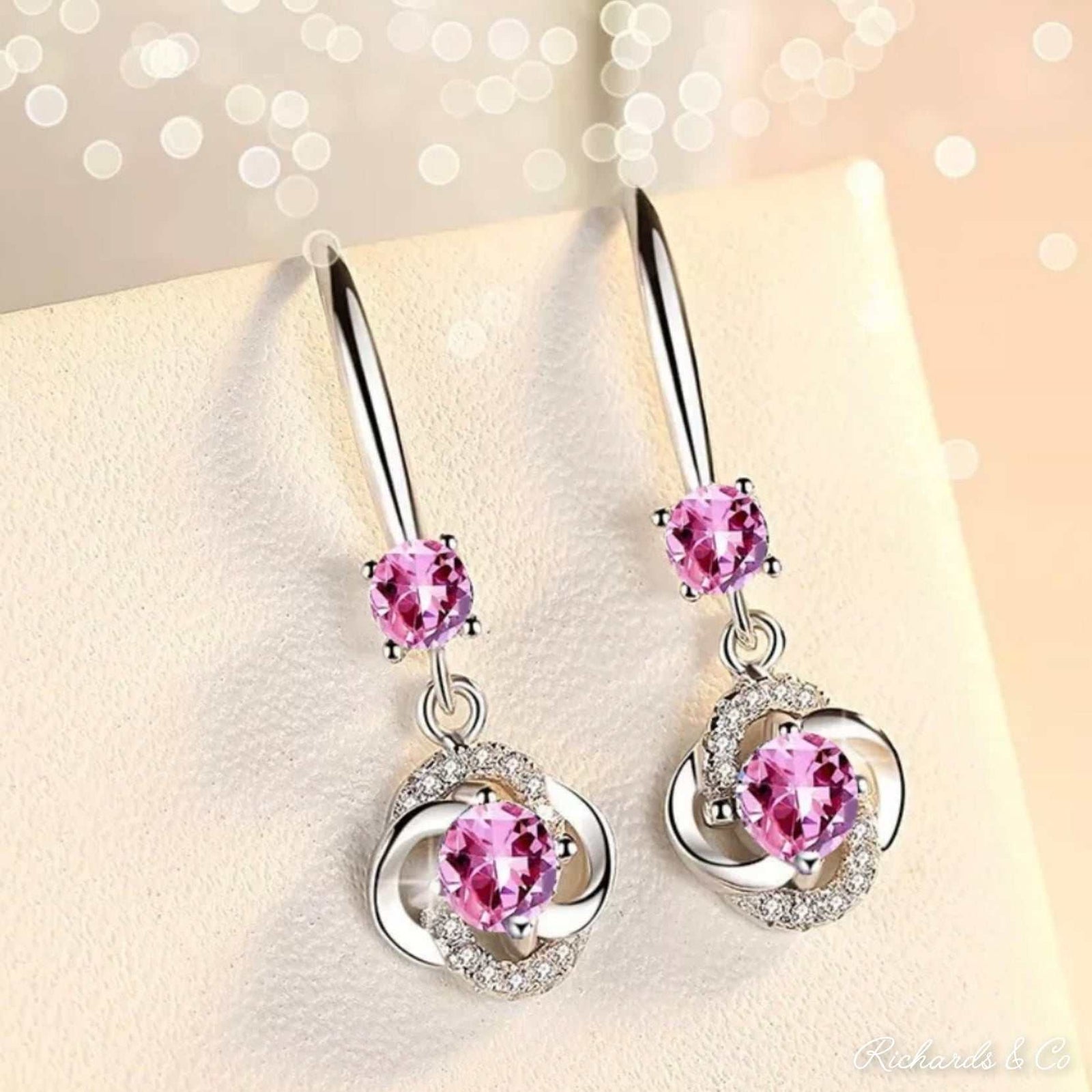 Pink Zircon Silver Drop Earrings with sparkling pink zirconia and cubic white stones, handcrafted in solid silver.