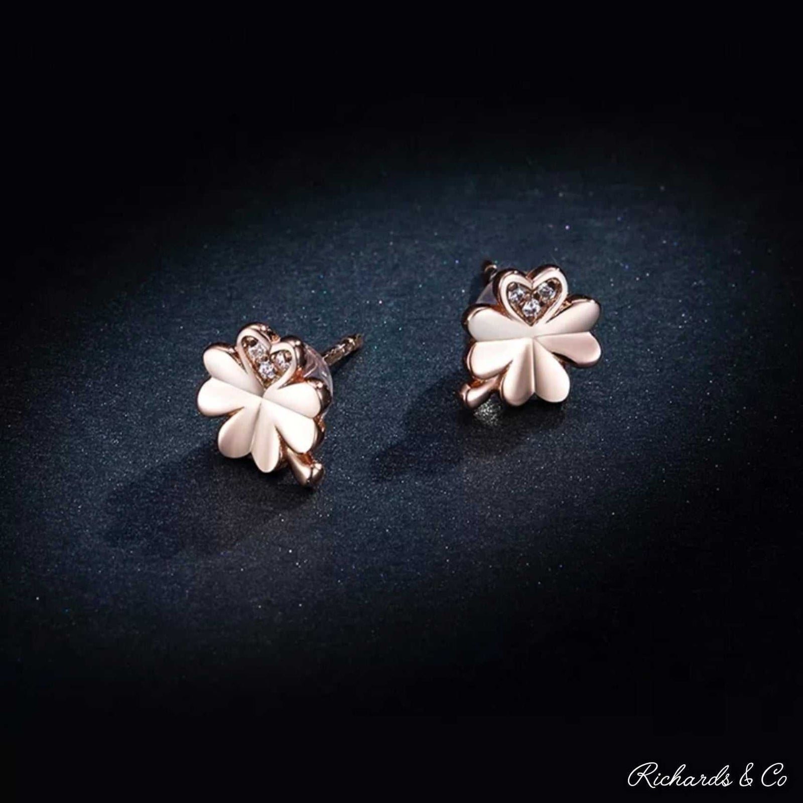 Rose Gold Lucky rose gold plated four leaf clover stud earrings with heart-shaped zircon detail