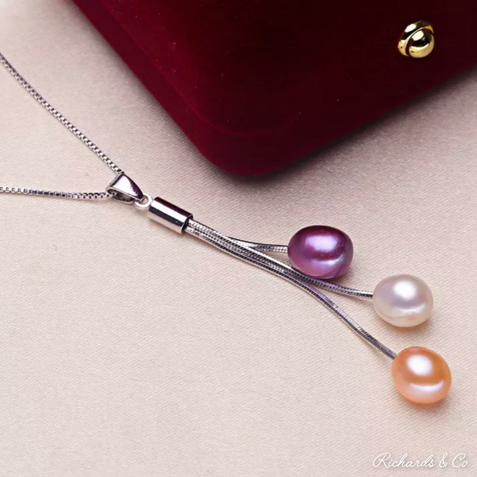 Elegant multi pearl silver necklace with purple, white, and peach freshwater pearls on a 45cm sterling silver chain