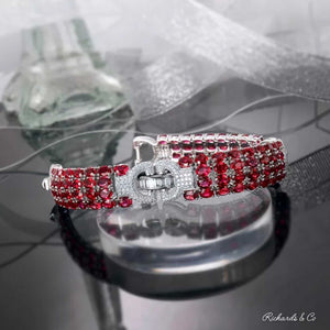 LANCY Ruby & Diamond Bracelet with oval rubies and round cut diamonds in 18K white gold luxury jewelry