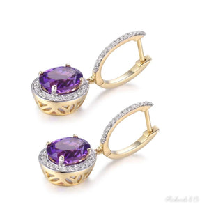 Elegant purple amethyst and diamond drop earrings set in 14k yellow gold