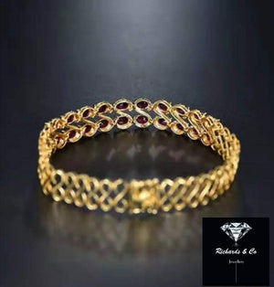 18K gold Ruby & Diamond Bracelet with oval rubies and diamonds chain link design