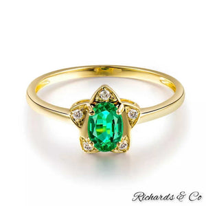 Natural Colombian Emerald oval ring with diamonds in 18k yellow gold star design