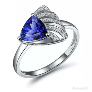 TABBY Tanzanite and diamond ring in 18k white gold with 1.2ct trillion cut tanzanite and bezel-set diamonds