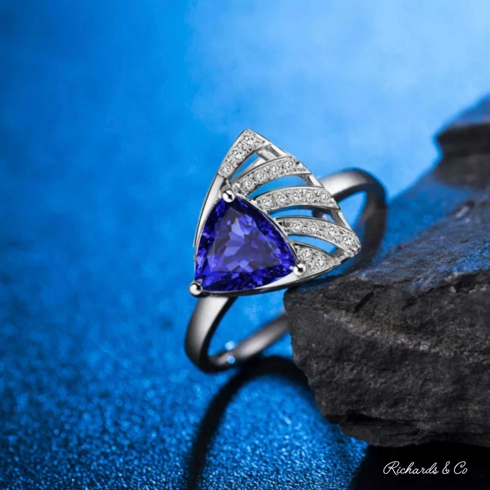 TABBY Tanzanite and diamond 18k white gold ring with trillion-cut blue tanzanite and bezel-set diamonds