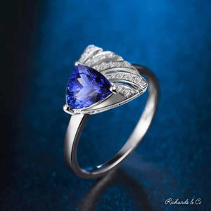 TABBY Tanzanite and diamond 18k white gold ring with trillion cut tanzanite and round diamonds in bezel setting