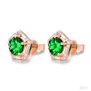 Tsavorite diamond stud earrings, set in solid 14k rose gold. 