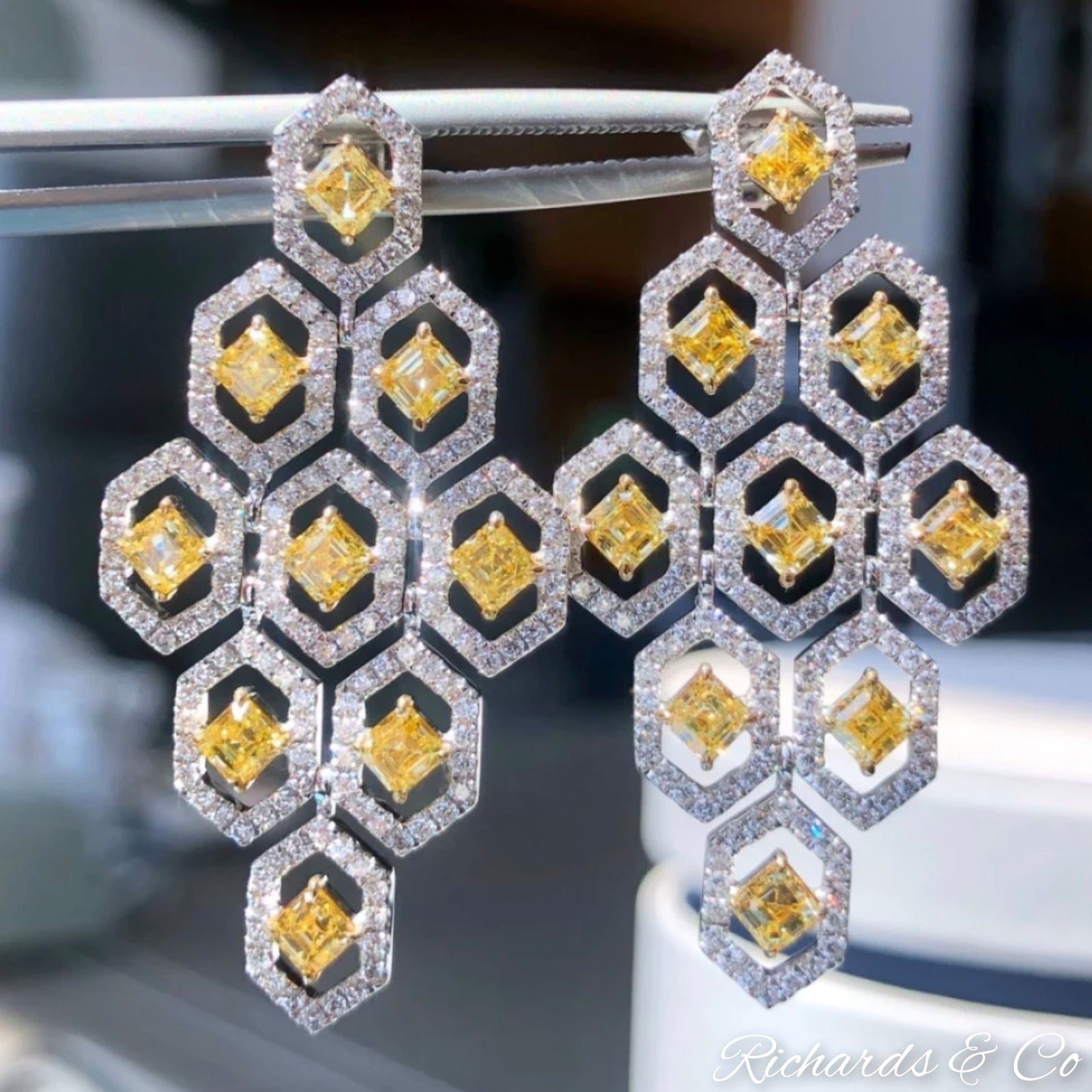 Luxury natural yellow and white diamond drop earrings in 18K white gold with geometric design