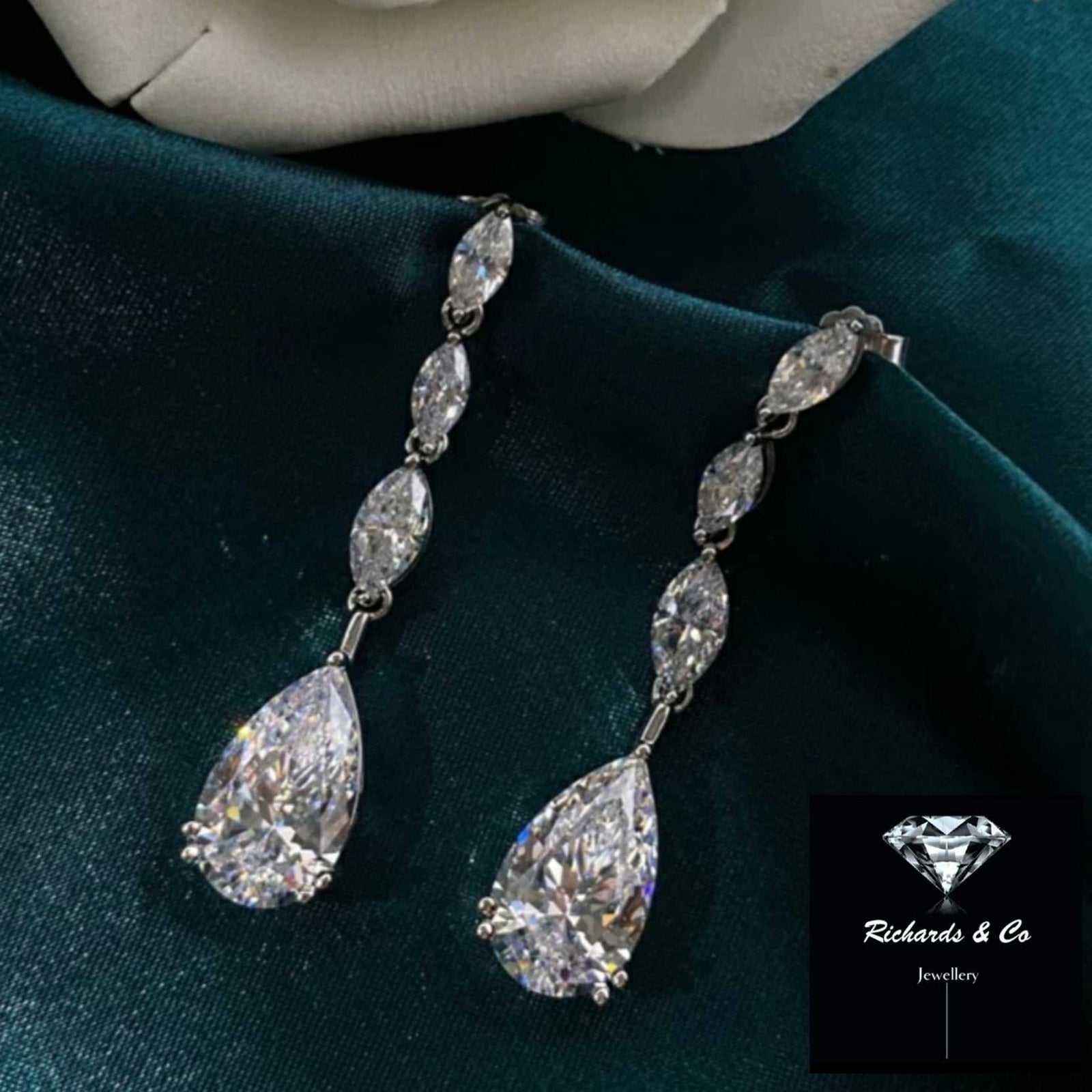 sparkling AAA zircon drop silver earrings with pear-shaped design