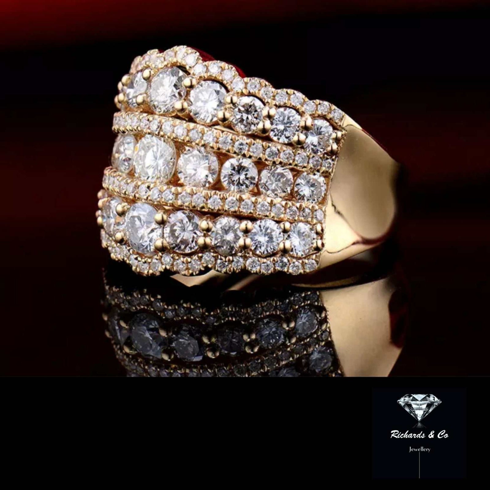 Diamond 18K yellow gold ring with three rows of round natural diamonds in channel setting