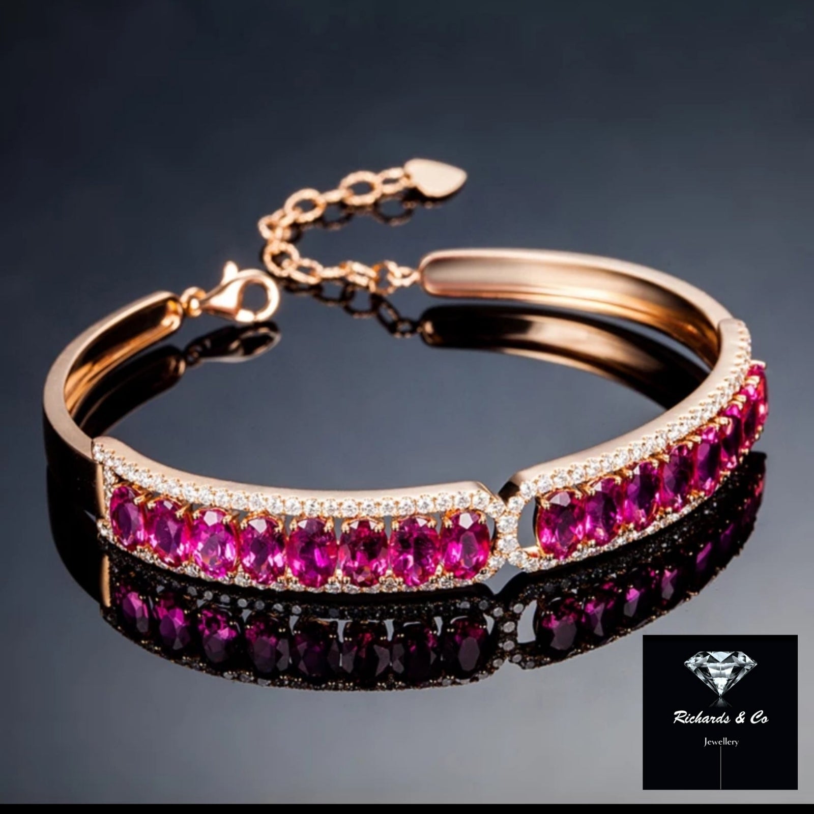 Diamond and purple tourmaline bangle in 18K rose gold with flawless diamonds and deep pink stones