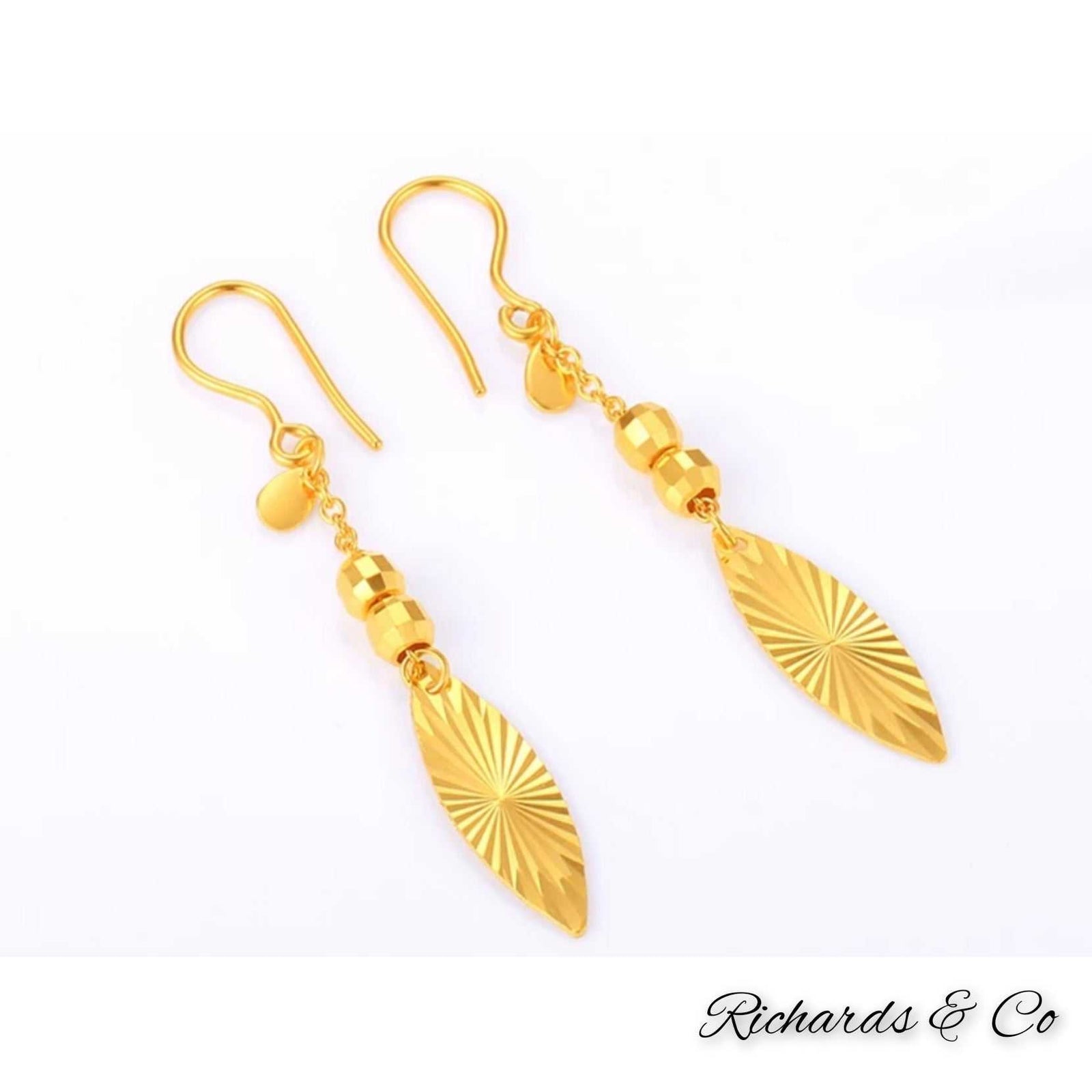 Yellow gold long drop earrings with intricate hand-crafted bead and ball design