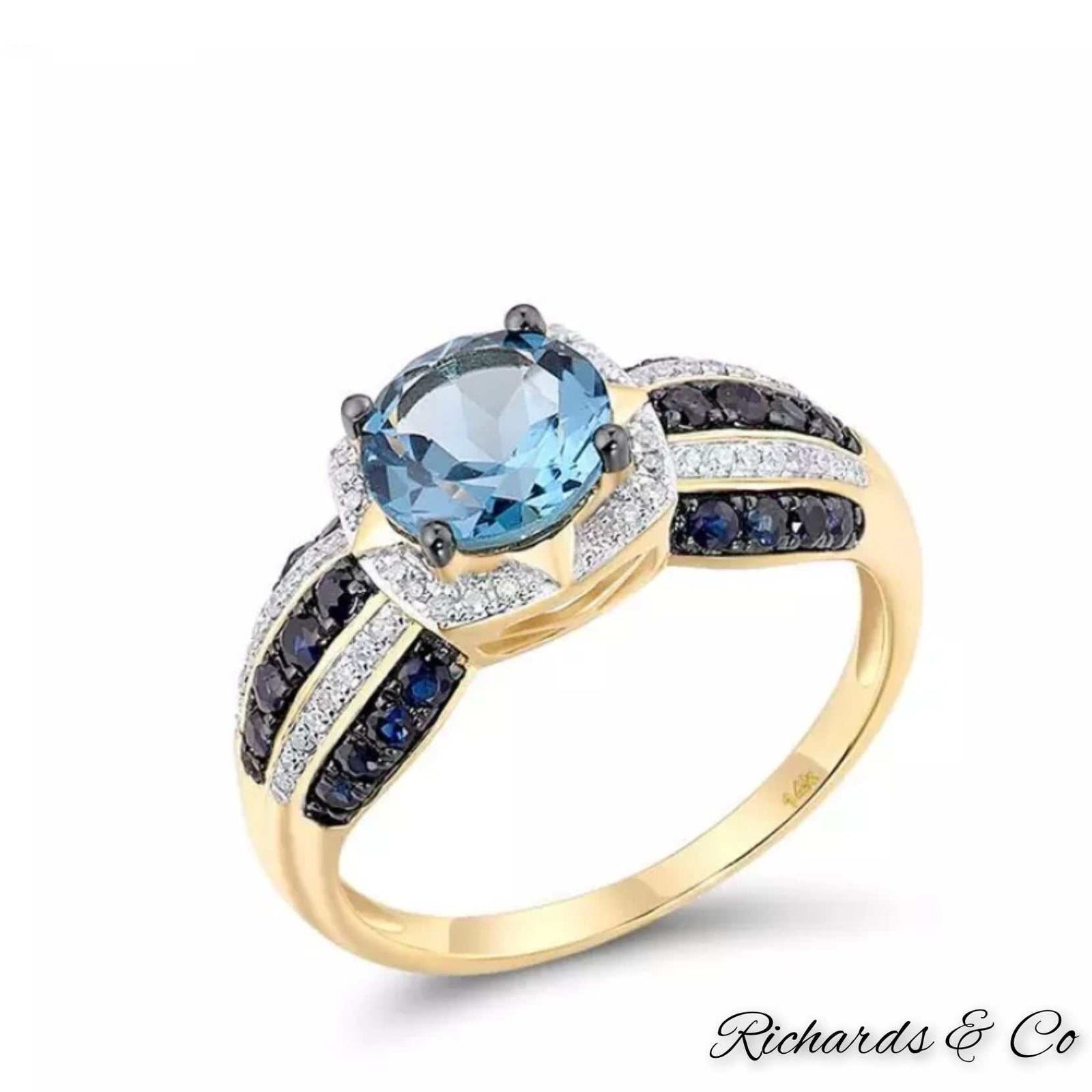 14k yellow gold ring with diamond, sapphire, and blue topaz gemstones from FAITH Collection