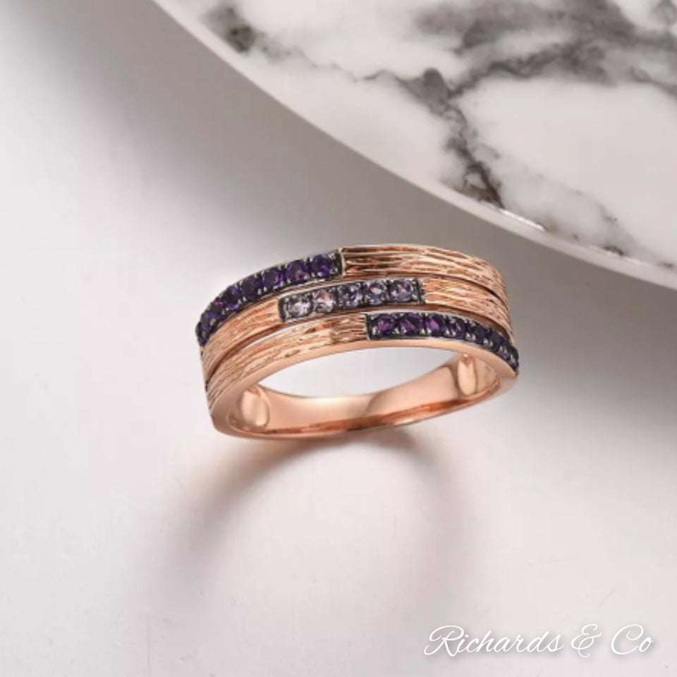 Purple Amethyst 9K Rose Gold band ring with pave-set round cut amethysts and textured rose gold band