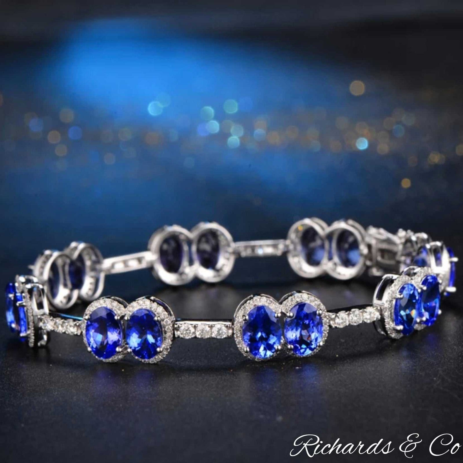 TALLULAH bracelet featuring 11.4ct oval Tanzanite and 1.60ct round diamonds set in 14K white gold with pave setting