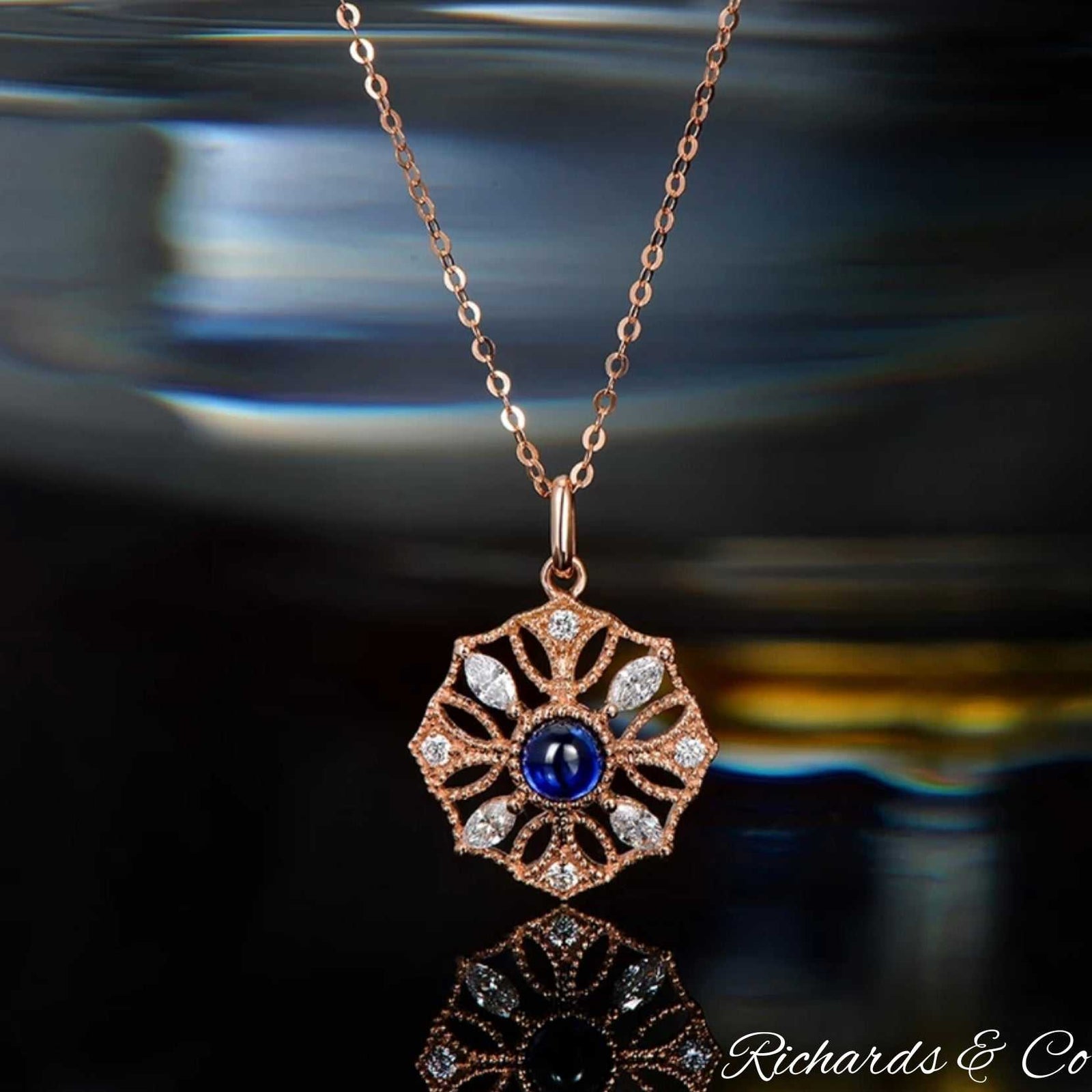 MACARIA - Sapphire & Diamond Necklace with 14K rose gold, blue sapphire center, and diamond accents