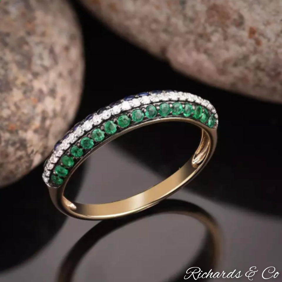 14k yellow gold band ring with natural emeralds, sapphires, and diamonds in pave setting