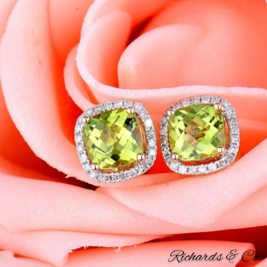 Scarlett collection natural peridot and diamond stud earrings in 14K yellow gold nestled in a pink rose
