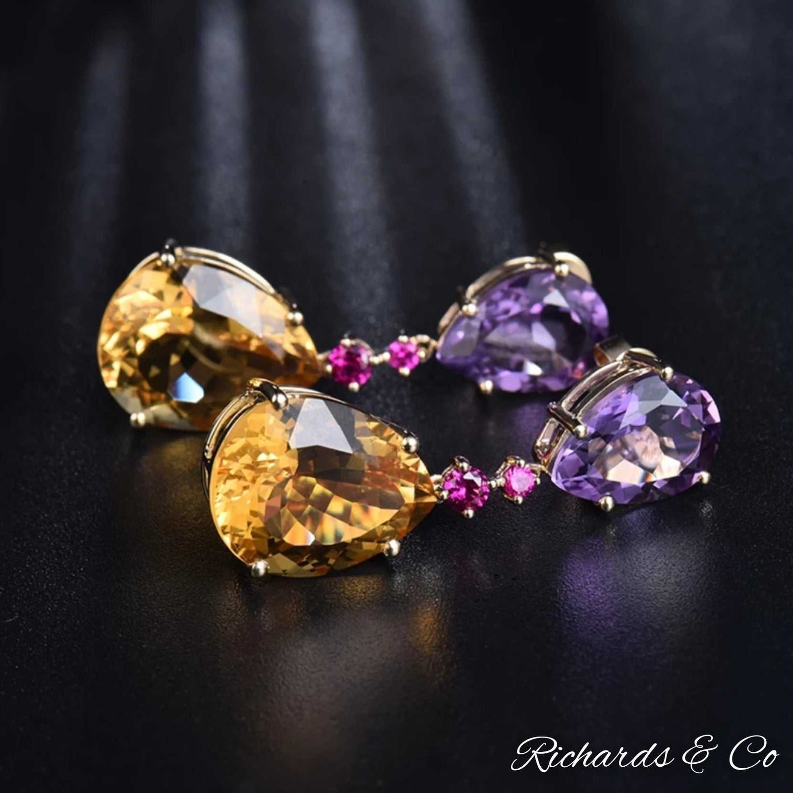 SASHA Earrings with pear-cut amethyst, citrine, and ruby gemstones set in 14k yellow gold drop design