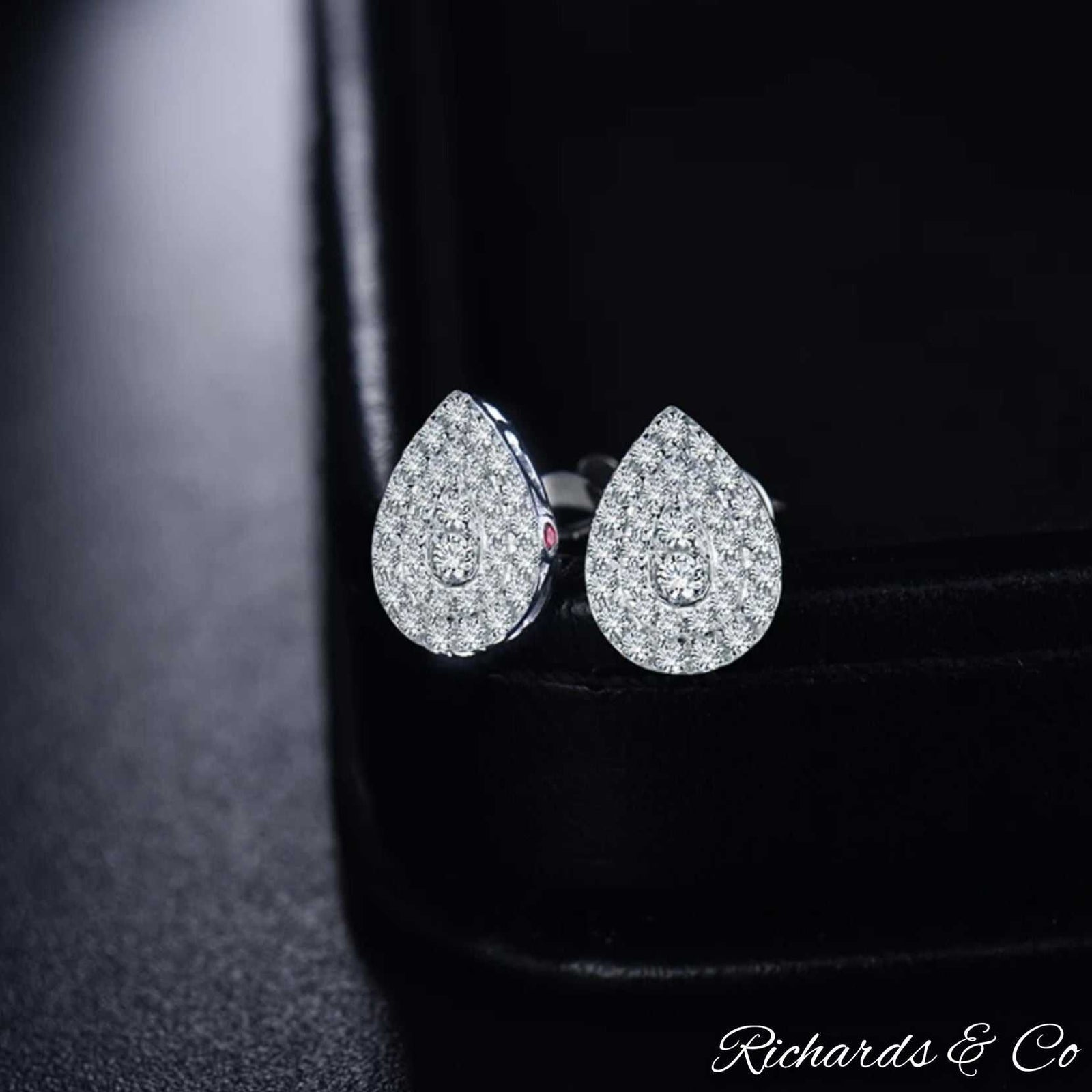 Diamond pear earrings stud with natural diamonds in 14k white gold and pink sapphire accents