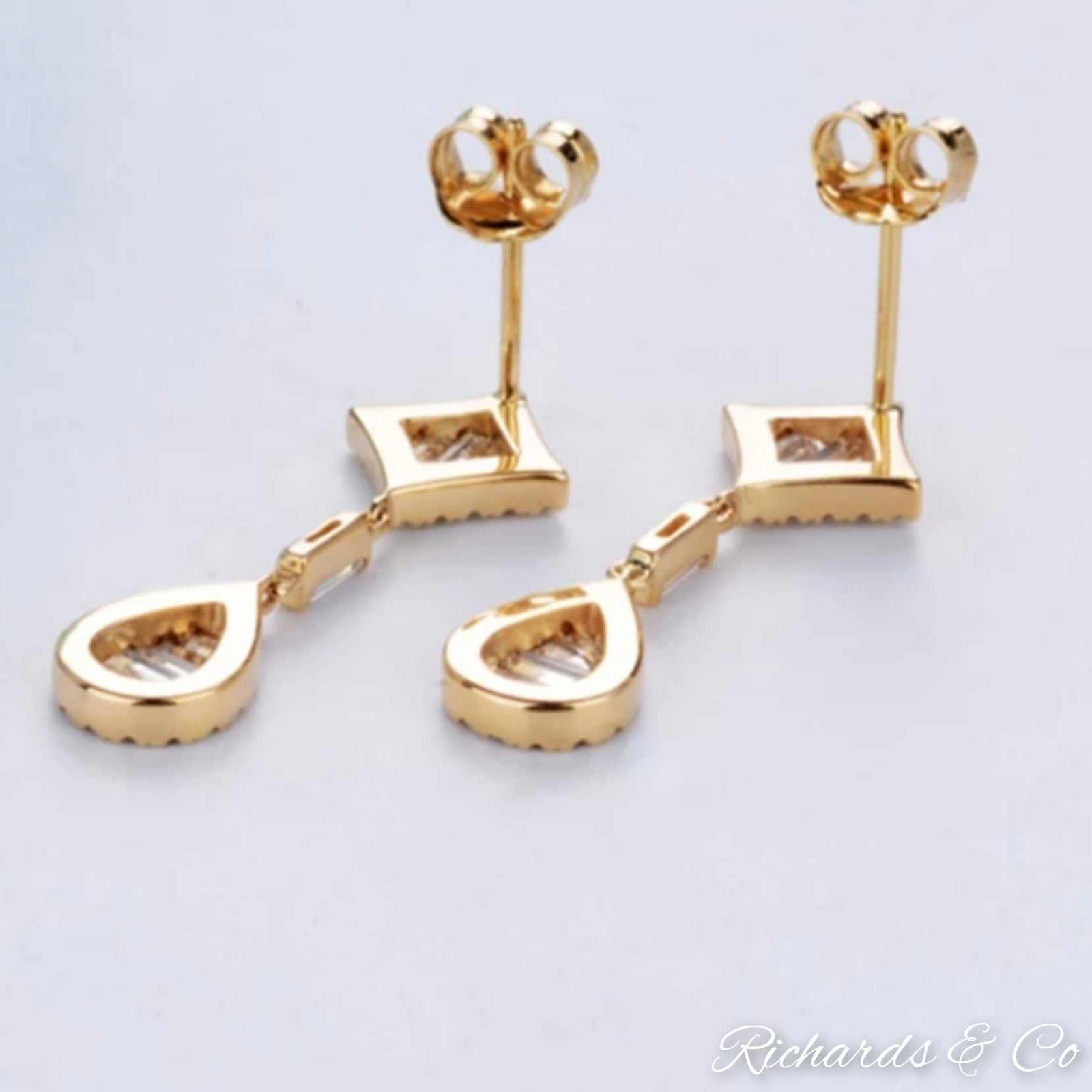 ZOE Collection Diamond Drop Earrings in 18k yellow gold with baguette and round cut natural diamonds