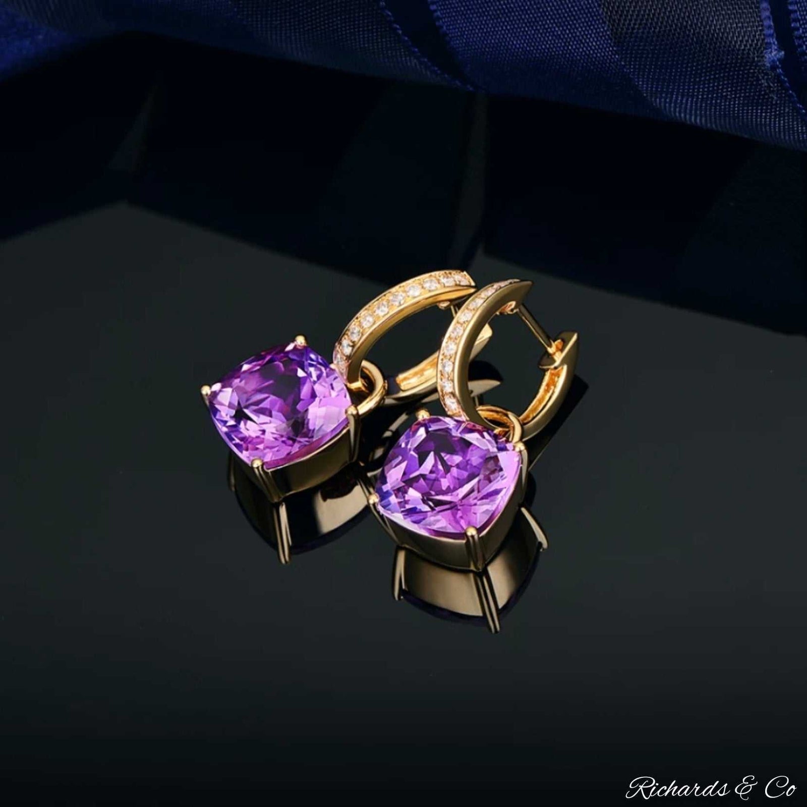 14k yellow gold amethyst and diamond drop earrings with purple gemstones and sparkling diamonds